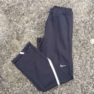 Nike Dri-Fit grey warm-up sweat pants.